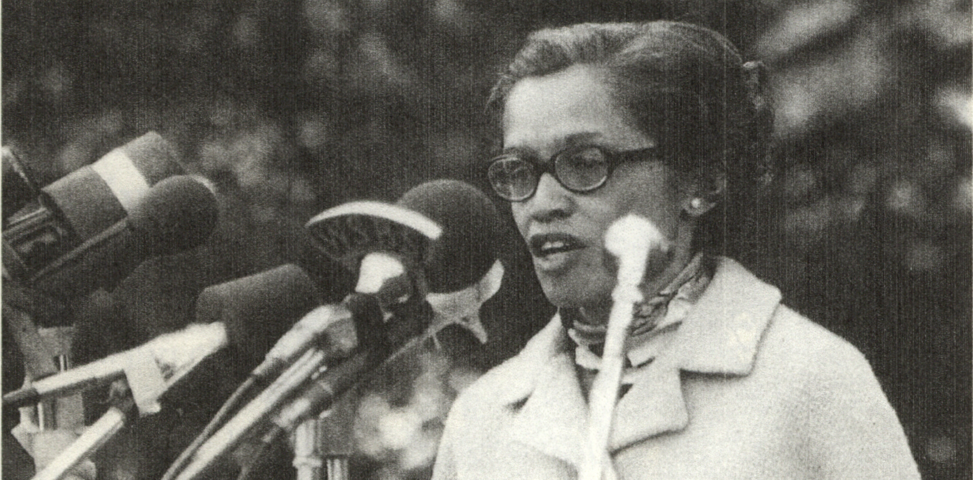 photo of Esther Cooper Jackson speaking at a rally